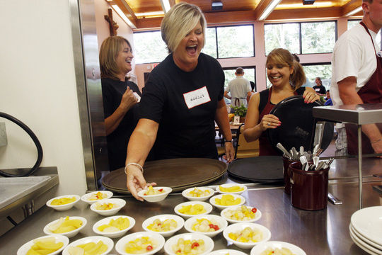 Red Sox wives serve dinner at Cor Unum, Local News