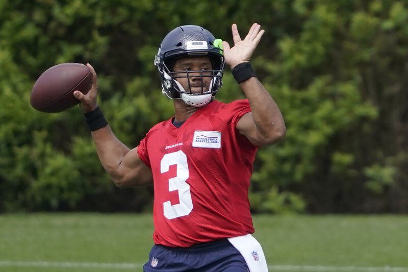 Seahawks' Russell Wilson Reports To OTAs