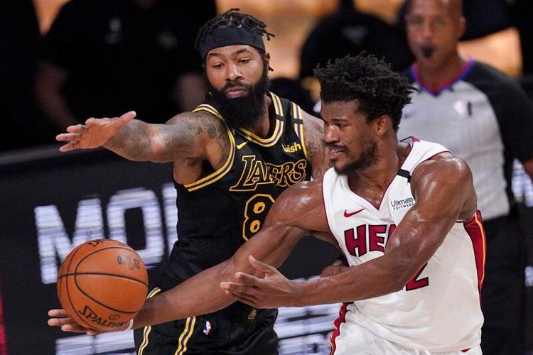 Miami Heat forward Jimmy Butler plays during the second half in Game 4 of  basketball's NBA Finals against the Los Angeles Lakers Tuesday, Oct. 6, 2020,  in Lake Buena Vista, Fla. (AP