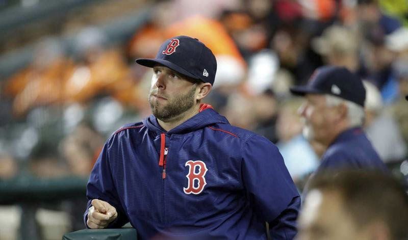 Dustin Pedroia helps out at Red Sox spring training