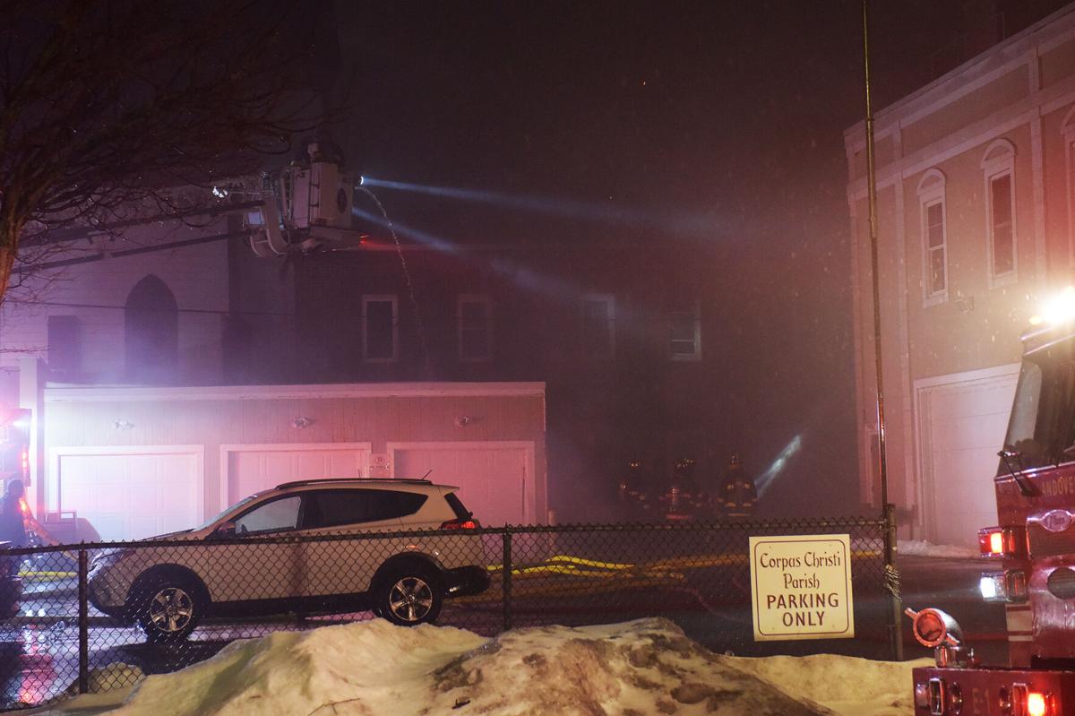 Firefighters battle blaze in church rectory for hours Monday night