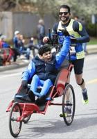 Father and son prepare for Boston Triathlon