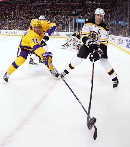 Milan Lucic scores in return to Boston; Kings rout Bruins 9-2