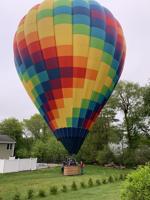 Just dropping in: Hot-air balloon delivers surprise to Salem yard