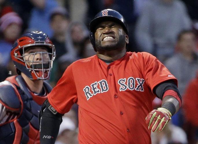 Red Sox Hanley Ramirez grimaces in pain after being stuck by a