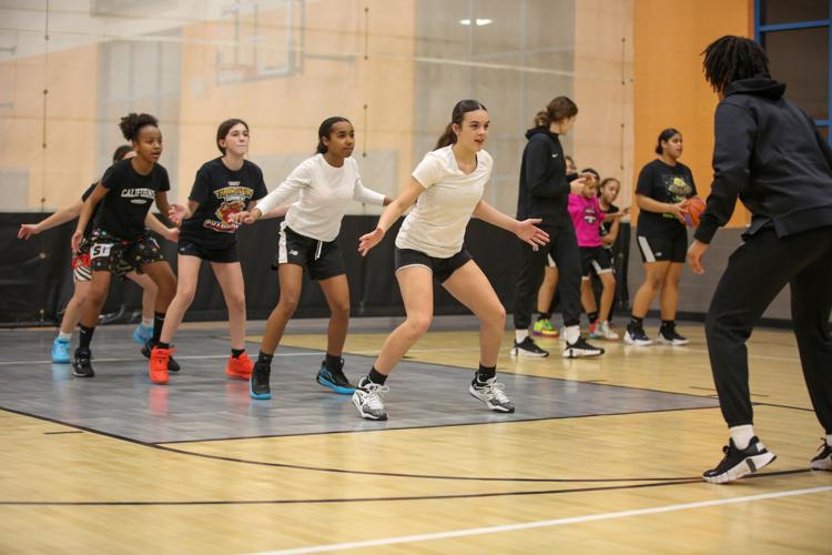 Photos from Harvard women's basketball's clinic at the Lawrence Boys