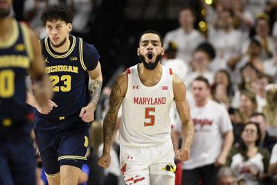College Basketball Roundup Maryland Tops Michigan For Big Ten