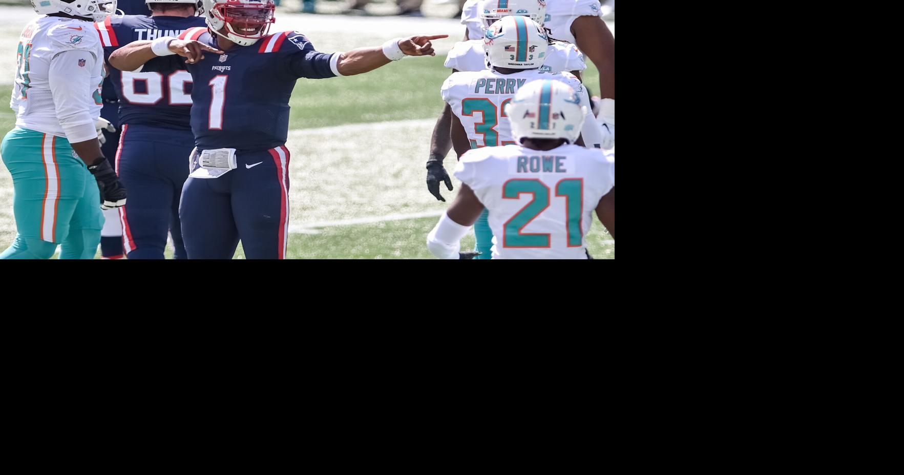 SLIDESHOW: New England Patriots beat Miami Dolphins 21-11 in