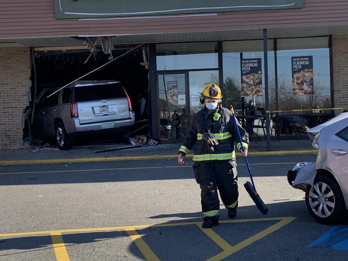 SUV crashes into Panera Bread