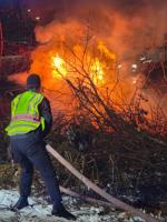 Firefighters tackle rollover car fire on Interstate 93