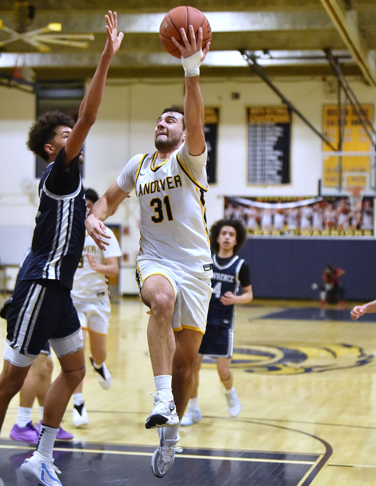 Andover High Basketball Secures MVC Large Title with Chemistry and