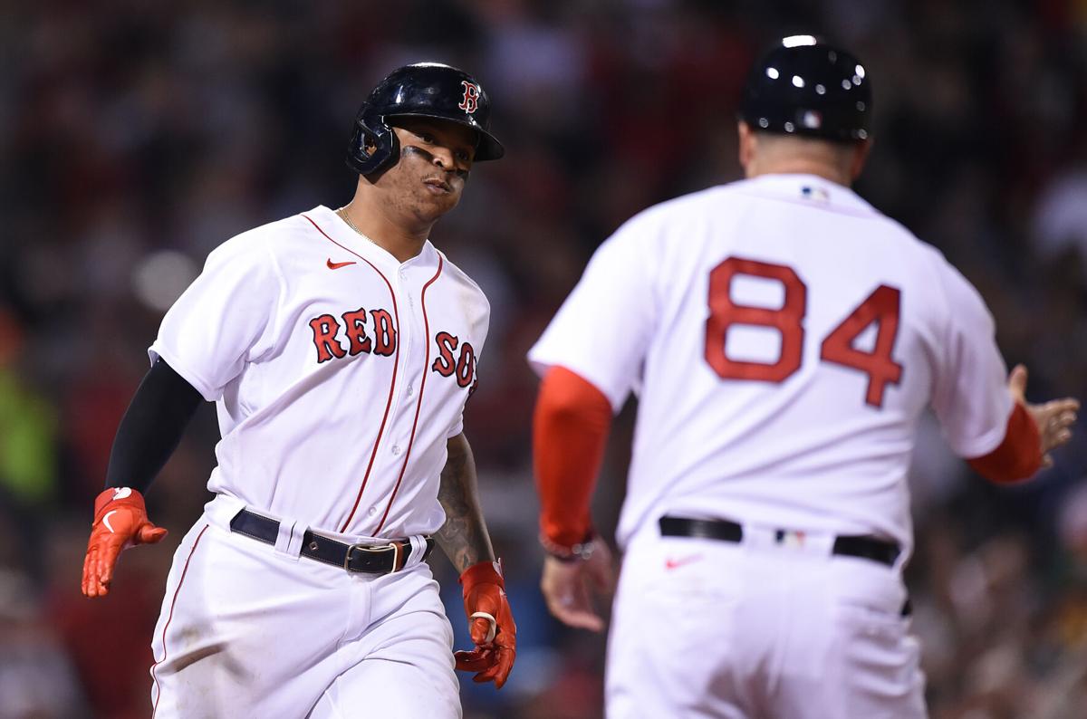 Manny Ramirez offers contract advice to Rafael Devers and Xander