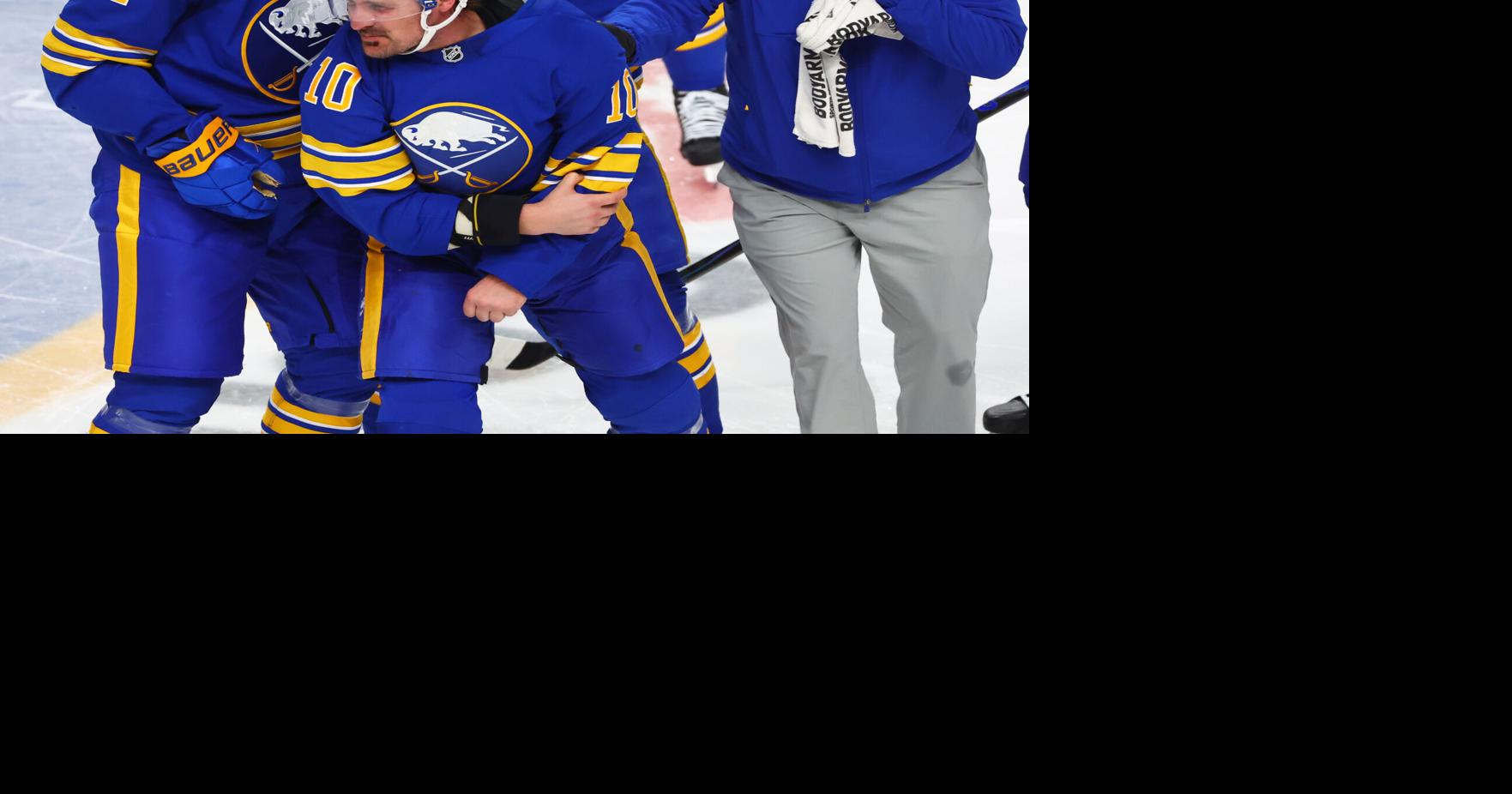 Sabres center Sam Carrick suffers left arm injury in fight with ...