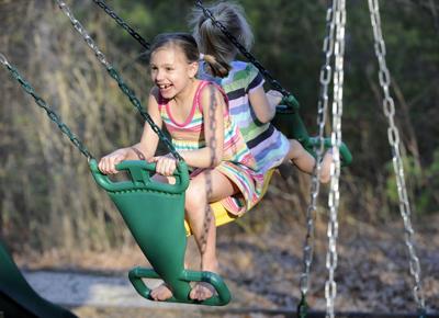 Tim Jean Staff Photo Cancer Survivor Madison Becht 8 Plays On The Swings With Her Sister Elizabeth 5 At Their Home In Windham Tim Jean Staff Photo Cancer Survivor Madison Becht 8 Plays On The Swings With Her Sister Elizabeth 5 At Their Home In Windham