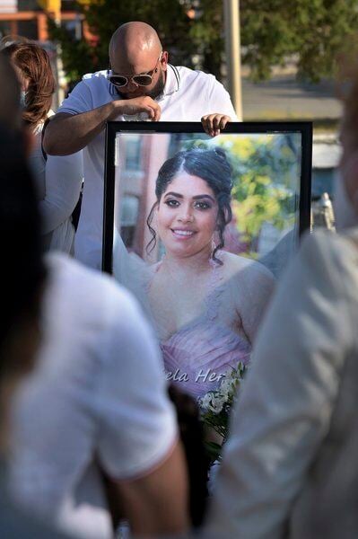 Lawrence woman killed in intersection crash was wife, mother of two