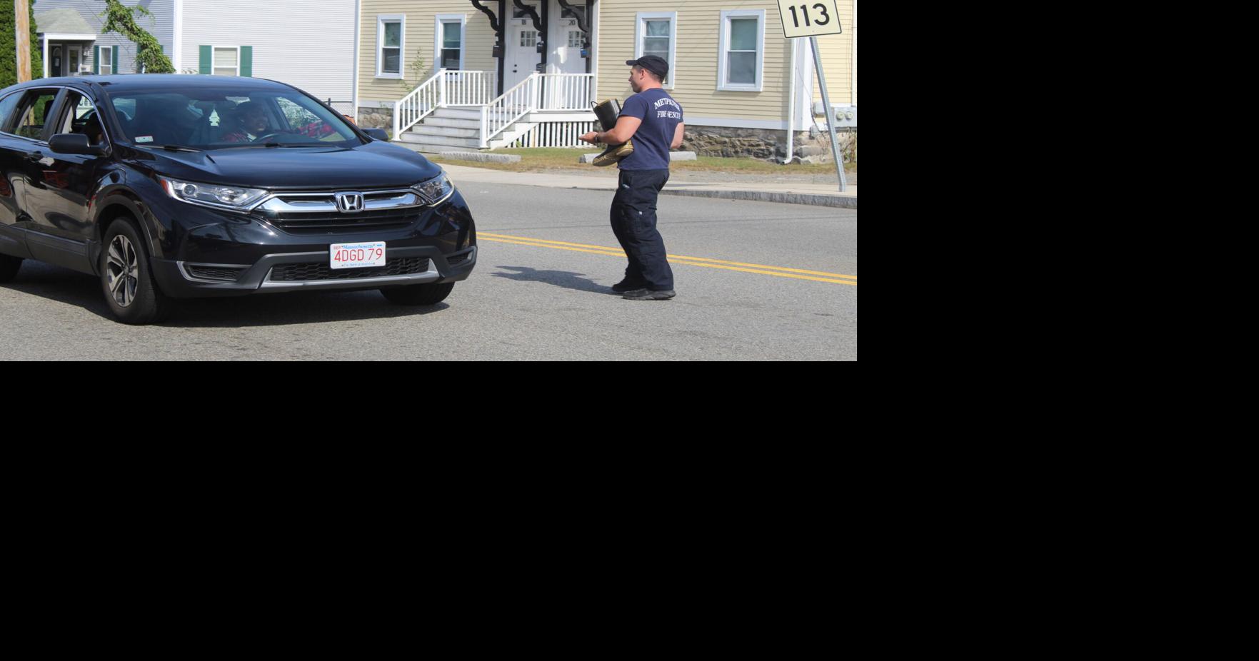 Firefighter Mark Fitzgerald received a donation for the "Fill the Boot