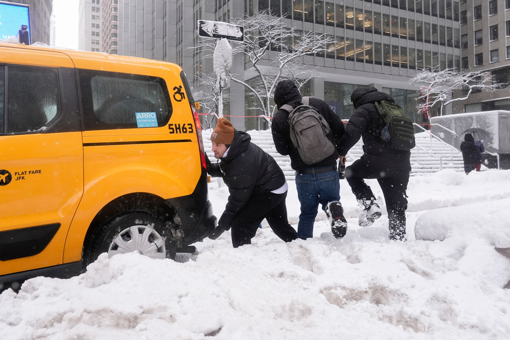 The Latest: Northeast US digs out from brutal snowfall as second