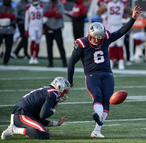 New England Patriots defensive end DaMarcus Mitchell warms up