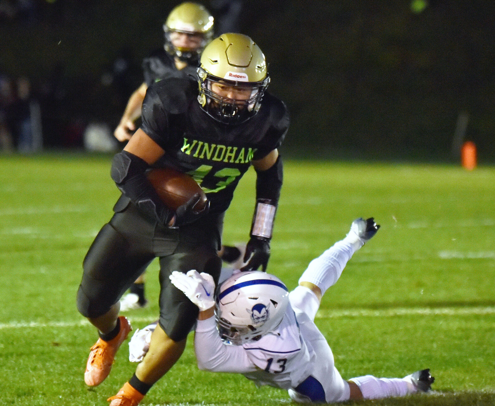 Windham High football team finds success in stormy game against Manchester Central