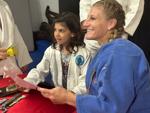Kayla Harrison with a new fan