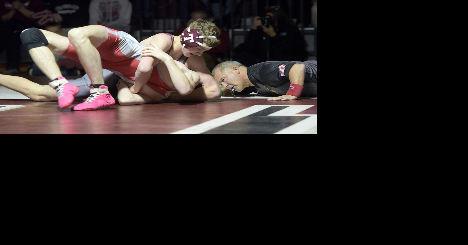 High School Sports Roundup: Golden Warriors storm back to pin down Scarlet Knights