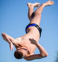 Champion divers started with leap of faith, awkward flops