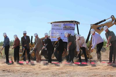 Mesa officials and Hilon executives