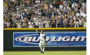 Arizona Diamondbacks' Luis Gonzalez, right, embraces teammate Craig Counsell  after Counsell hit a solo home run against the San Diego Padres during the  fourth inning of a baseball game Sunday, Oct. 1