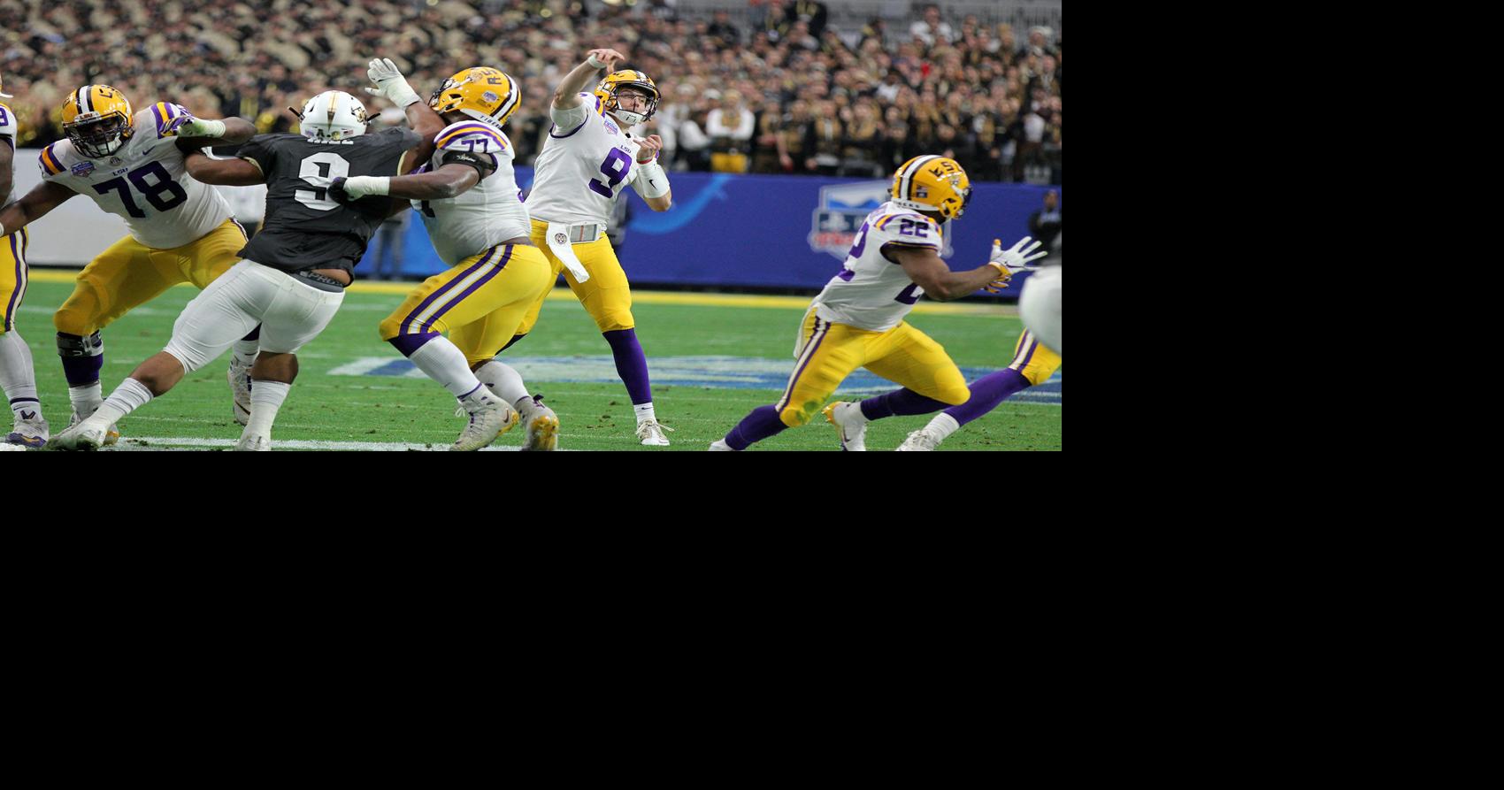 FILE - In this Jan. 1, 2019, file photo, LSU quarterback Joe Burrow attends  warmups before the Fiesta Bowl NCAA college football game against UCF in  Glendale, Ariz. This year, a group