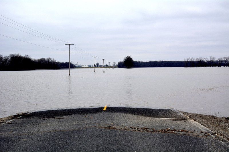 Embarras River floods North 1900th Street swallowed by water after levee breach Local News
