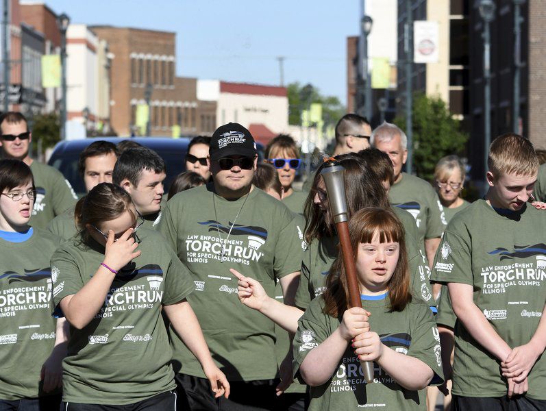 Torch Run Special Olympians shine during fundraiser Local News
