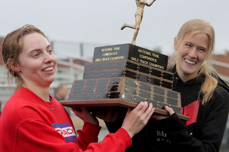 Ada Rozene DOGS ON TOP: St. Anthony boys and girls track and field teams take ...