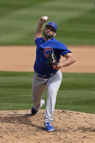 Chicago Cubs' Mark Leiter Jr. throws during a spring training