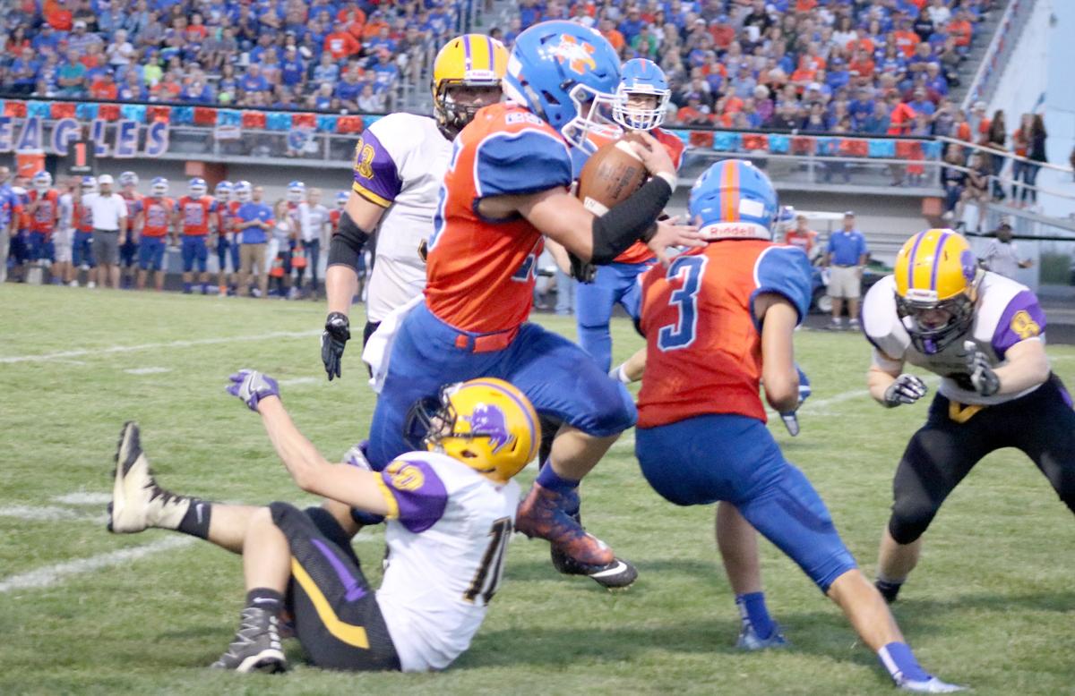 BLOCKING BEASTS Newton Oline leads Eagles to openingnight win