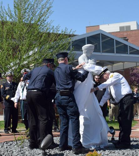 Statue memorializing St. Anthony Hospital fire unveiled - unveiling