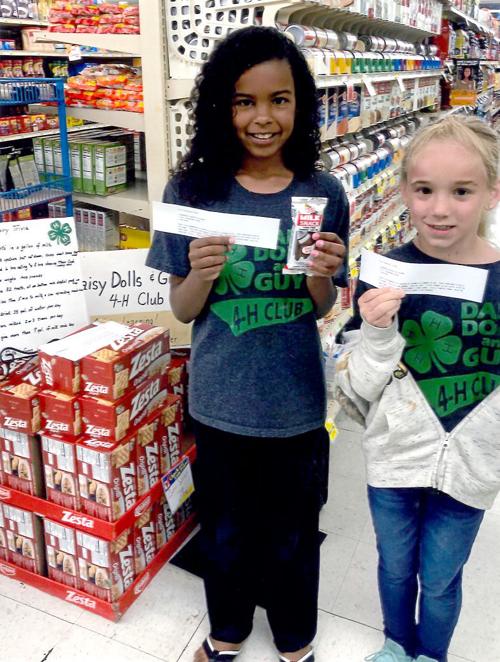 Dolls and Guys 4-H club out in community