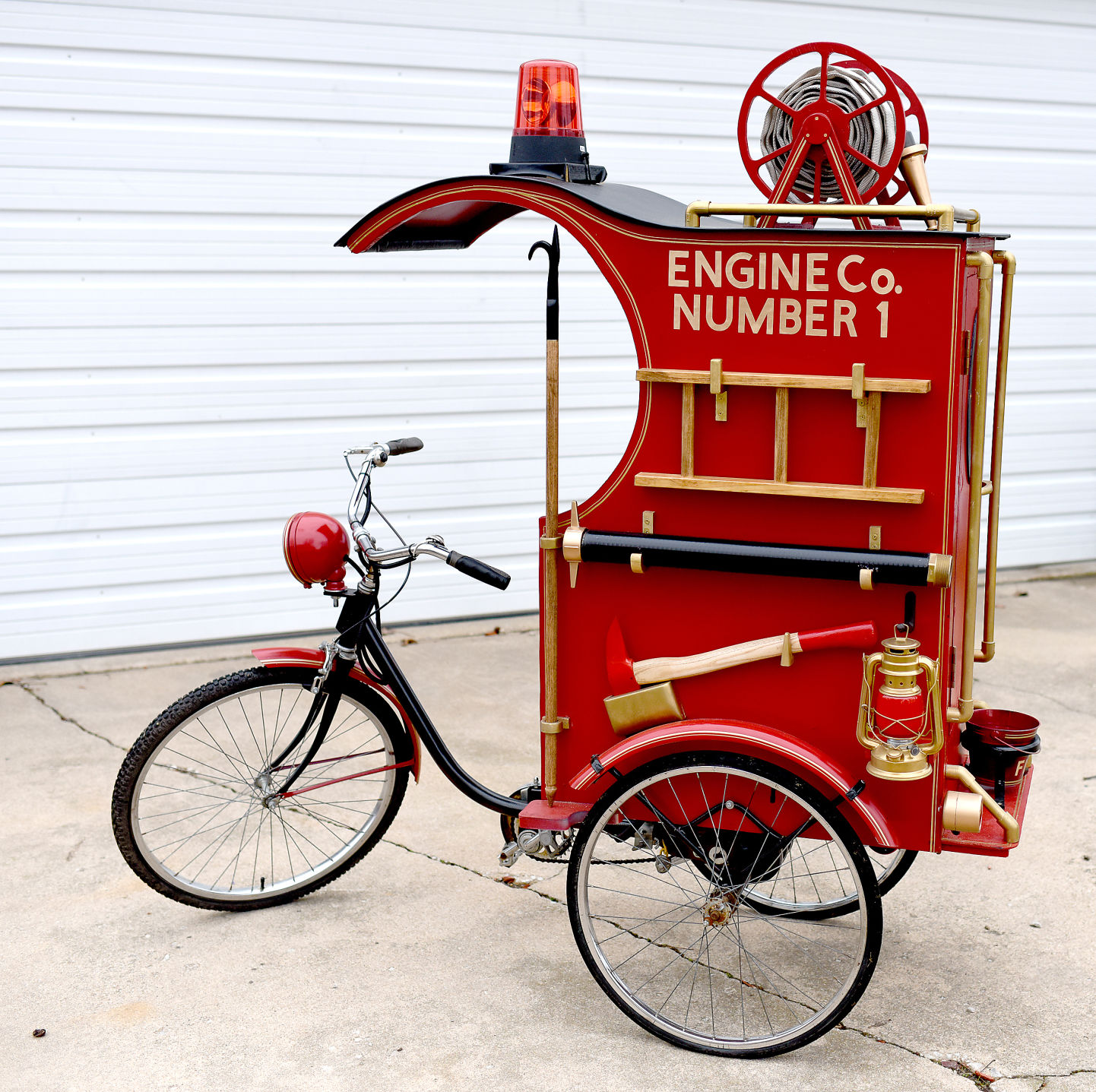 elmo riding a tricycle