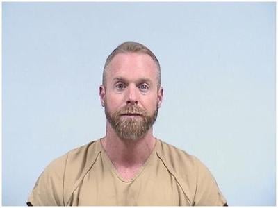 rebar ryan elkharttruth stomach arrested goshen putting gun woman man