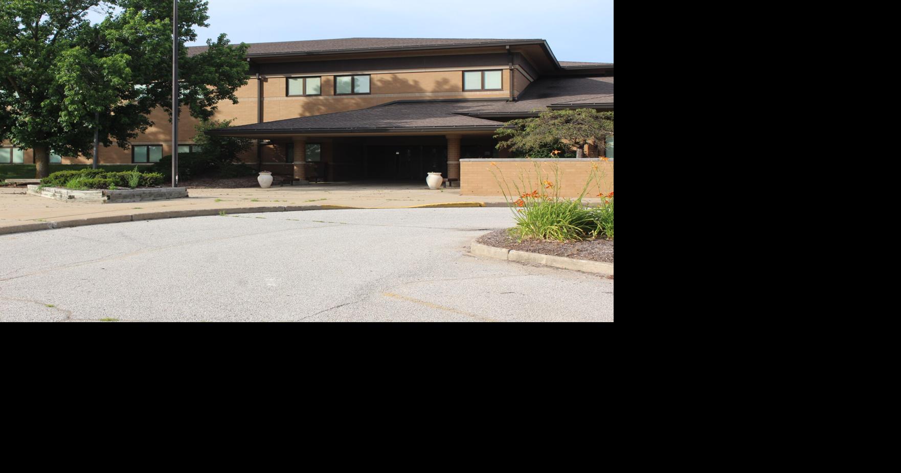Board considers pact with charter school for empty building