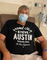 Former basketball coach Austin turns attention to cancer