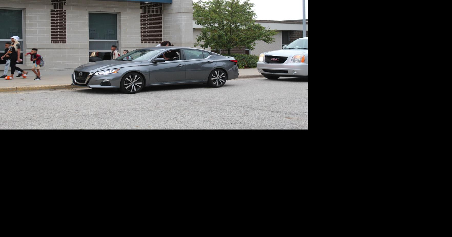 On the first day of classes, city and school district officials ...