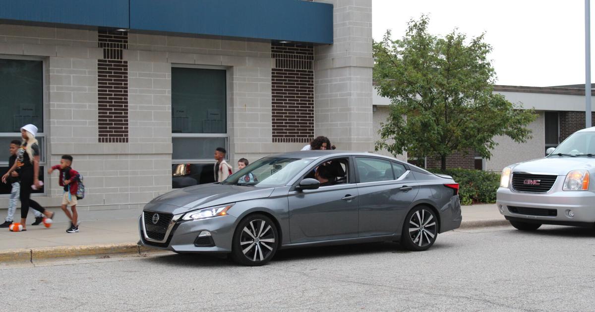 On the first day of classes, city and school district officials ...