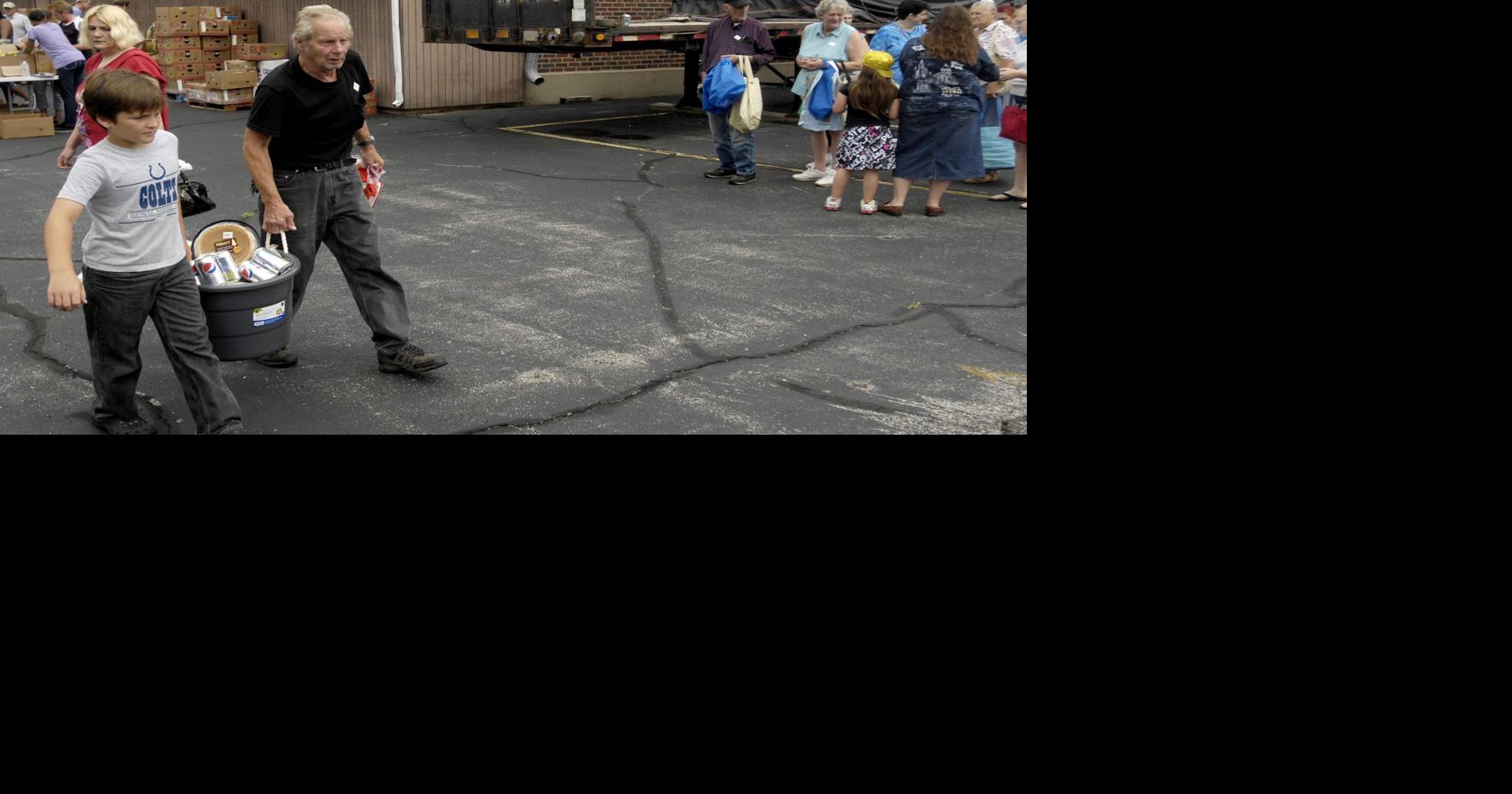 Area families get free food at mobile pantry event News