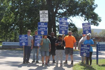 Elkhart Products employees hit the picket lines