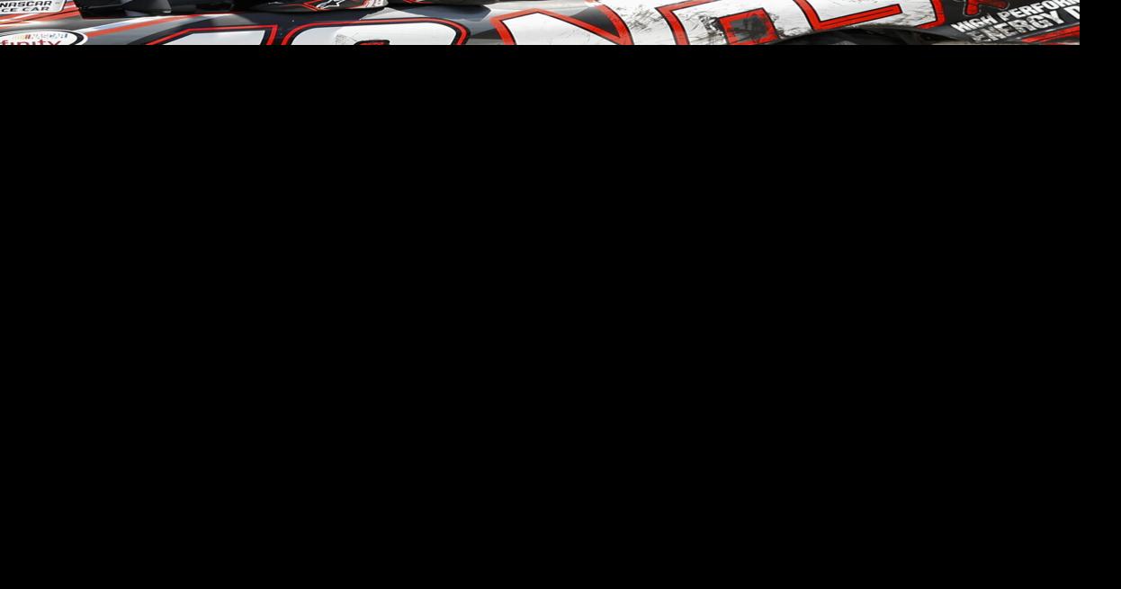 Xfinity Series driver driver Kyle Busch (18) celebrates after winning the XFINITY Series Alsco 300 auto race, Saturday, July 8,