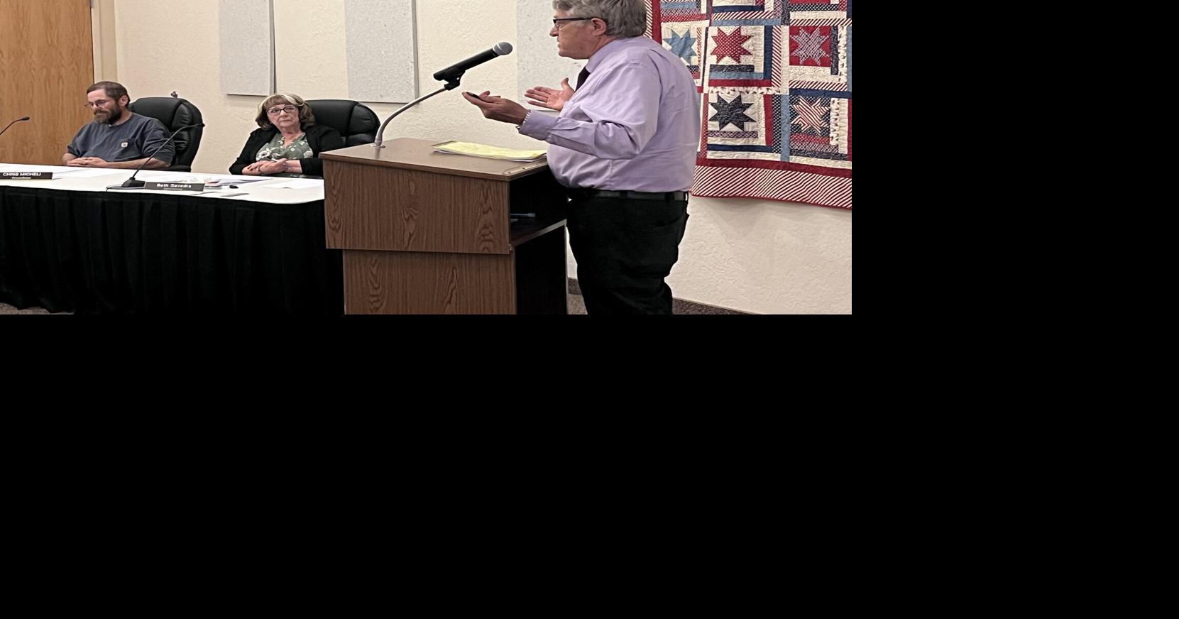Wells keeps work card background checks