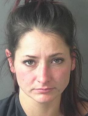 Woman arrested on assault with deadly weapon warrant