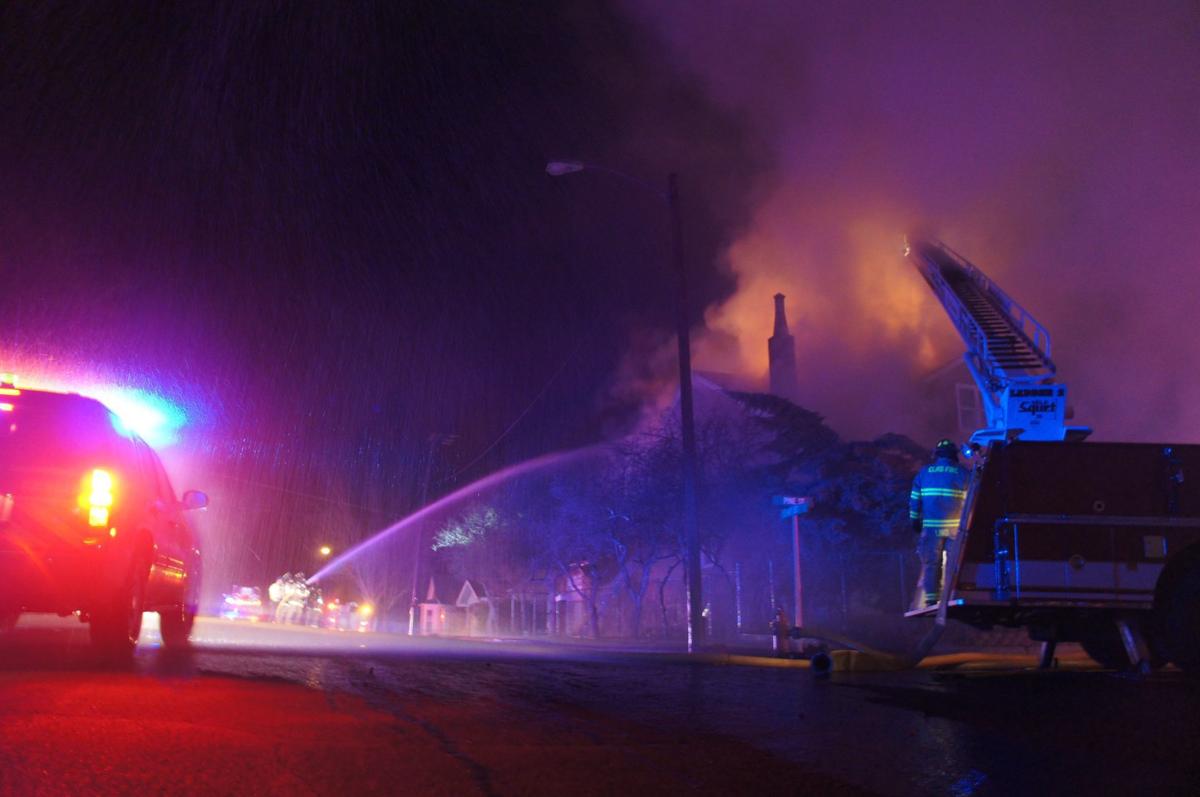 Fire caves in roof of Pine Street home