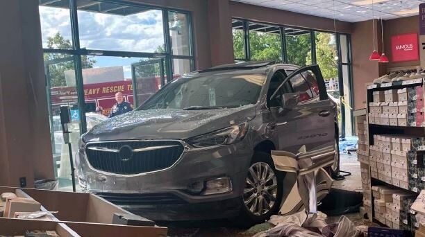 4 injured when SUV crashes into shoe store