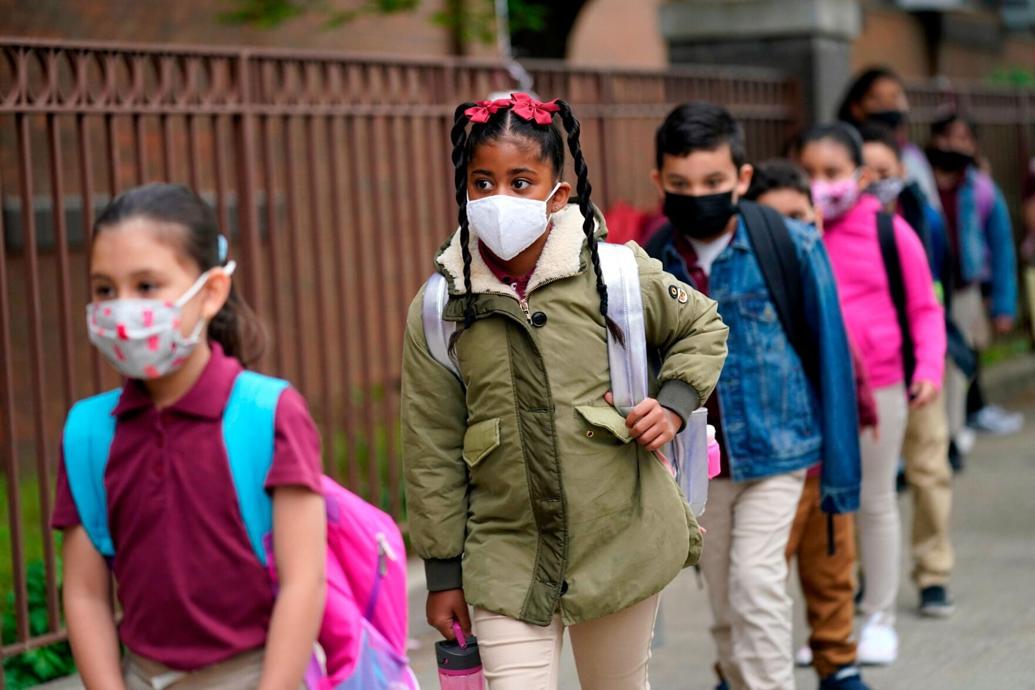 As states plan to lift school mask mandates, CDC remains vague on